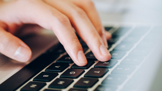 Hand Typing on Keyboard